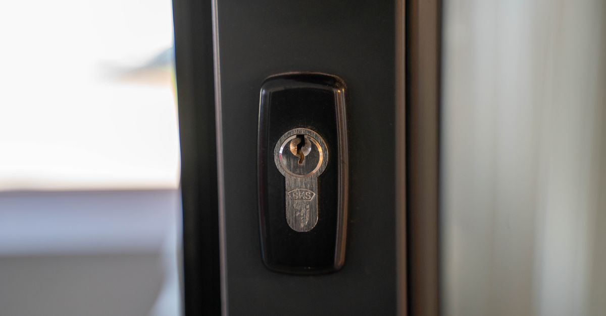 door lock cylinder close up — John Locksmiths